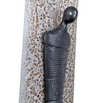 Veggskulptur på metall
