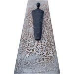 Veggskulptur på metall